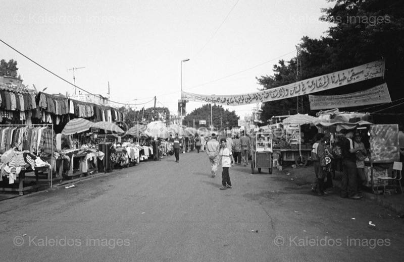 Kaleidos images;Merchants;Palestinian Refugees;Palestinians;Peddlers;People;Refugee camps;Shatila;Sidewalk vendor;Street Vendors;Streets;Tarek Charara;Vendors