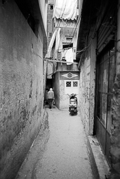 Alleys;Architecture;Kaleidos-images;Mopeds;Palestinian-Refugees;Palestinians;People;Refugee-camps;Shatila;Tarek-Charara;UNRWA;Woman;Women
