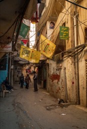 Architecture;Buildings;Cables;Kaleidos-images;Mopeds;Palestinian-Refugees;Palestinians;People;Refugee-camps;Shatila;Shops;Streets;Tarek-Charara;UNRWA;Alleys
