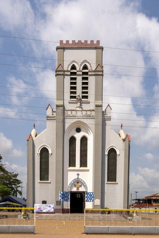 Benin, Ouidah, basilica, Basilica of the Immaculate Conception, Neo-Gothic architecture, Catholic church, façade, bell tower, Latin cross, religious heritage, West Africa, missionaries, SMA, Society of African Missions, Louis Dartois, François Steinmetz, minor basilica, 1903, 1909, John Paul II, exterior, colonial architecture, Dahomey; places of worship, Churches
