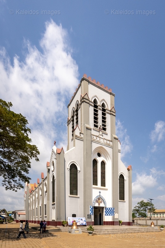 Benin, Ouidah, basilica, Basilica of the Immaculate Conception, Neo-Gothic architecture, Catholic church, façade, bell tower, Latin cross, religious heritage, West Africa, missionaries, SMA, Society of African Missions, Louis Dartois, François Steinmetz, minor basilica, 1903, 1909, John Paul II, exterior, colonial architecture, Dahomey;places of worship,Churches
