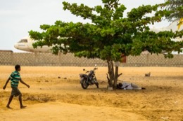 Barakah,-L1011-TriStar,-Lockheed-L1011,-abandoned-TriStar,-aircraft-wreck,-grounded-aircraft,-white-fuselage,-derelict-cockpit,-empty-cabin,-Cotonou-beach,-Cadjéhoun-beach,-Cotonou-Benin,-West-Africa,-Benin-airport,-Atlantic-coastline,-coastal-Benin,-corroded-wreck,-marine-rust,-deterioration,-salt-corrosion,-decay,-abandonment,-dereliction,-dilapidation,-environmental-erosion,-aviation-heritage,-industrial-archaeology,-failed-tourism-project,-open-air-museum,-urban-art,-colonial-relic,-Benin-history,-alternative-tourism,-architectural-curiosity,-aviation-history,-hajj-pilgrimage,-Air-Rum-airline,-defunct-carrier,-humanitarian-transport,-international-migration,-historical-traces,-industrial-heritage,-stranded-aircraft,-tourist-attraction,-urban-exploration,-ruin-photography,-beach-adventure,-Beninese-leisure,-amusement-park,-immersive-experience,-urban-safari,-overcast-sky,-sunset-beach,-tropical-storm,-coastal-erosion,-sea-salt,-Atlantic-Ocean,-white-sand,-coastal-vegetation,-gleaming-white,-nature-machine-contrast,-aerospace-geometry,-outstretched-wings,-empty-windows,-cabin-stairway,-cockpit-instruments,-time-displacement,-obsolescence,-suspended-time,-liminality,-aborted-transformation,-urban-memory,-unfinished-dream,-nature-industry-symbiosis,-tourism-ghost,-frozen-history