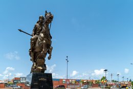 Benin;-Bio-Guéra;-Bridle;-Colonial-resistance;-Colonial-taxation;-Commercial-signage;-Cotonou;-Equestrian-statue;-Erevan-junction;-Harness;-Kaleidos;-Kaleidos-images;-La-parole-à-limage;-Monument;-Rearing-horse;-Solar-street-lamp;-Spear;-Tarek-Charara;-Turban;-Turbaned-horseman;-West-Africa