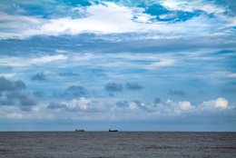 Atlantic-Ocean;-Benin;-Cargo-ship;-Clouds;-Coastline;-Corniche-Est;-Cotonou;-Gulf-of-Benin;-Horizon;-Kaleidos;-Kaleidos-images;-La-parole-à-limage;-Sea;-Ship;-Ships;-Sky;-Stories-Pictures;-Tarek-Charara;-West-Africa