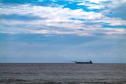 Atlantic-Ocean;-Benin;-Clouds;-Coastline;-Corniche-Est;-Cotonou;-Dredger;-Dredging;-Dredging-vessel;-Gulf-of-Benin;-Horizon;-Kaleidos;-Kaleidos-images;-La-parole-à-limage;-Sea;-Ship;-Smoke;-Stories-Pictures;-Tarek-Charara;-West-Africa