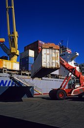 Comoros-Archipelago;-Container;-Crane;-France;-Handling;-Indian-Ocean;-Kaleidos;-Kaleidos-images;-La-parole-à-limage;-Laurent-Abad;-Maritime-transport;-Mayotte;-Port;-Reach-stacker;-Ship;-Stories-Pictures