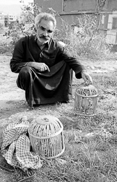 Birds;Bird-cages;Cages;Kaleidos-images;Man;Men;Palestinian-Refugees;Palestinians;Refugee-camps;Shanty-Towns;Shatila;Tarek-Charara